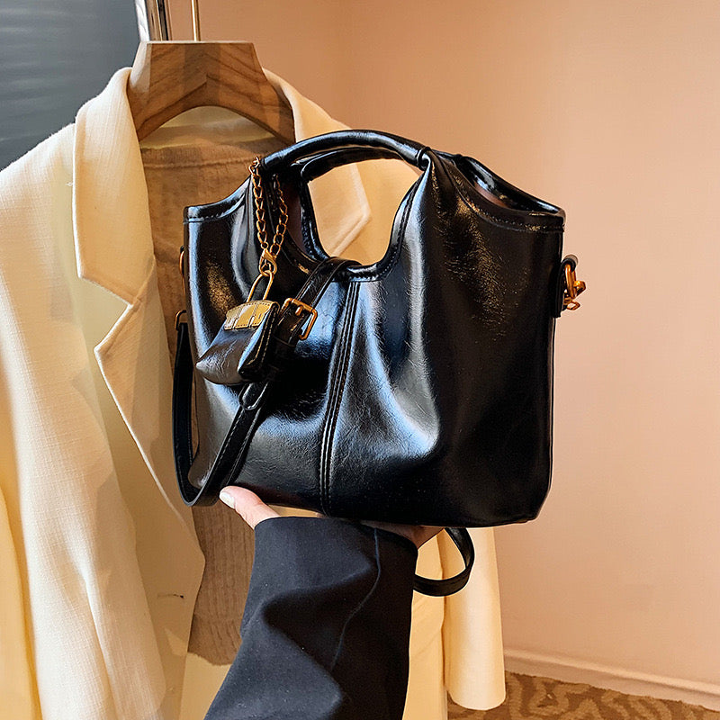 Hand-held bucket bag with small bag hanger